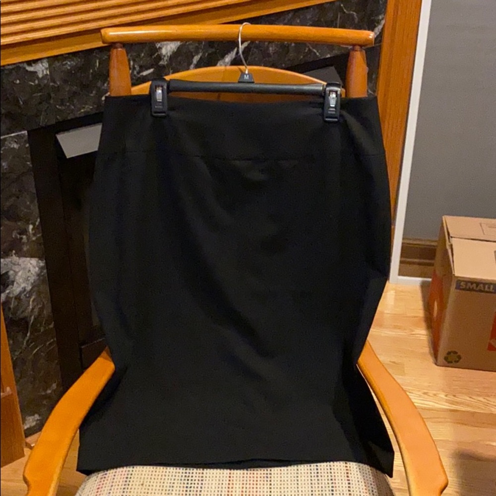 Zippered lined black skirt.